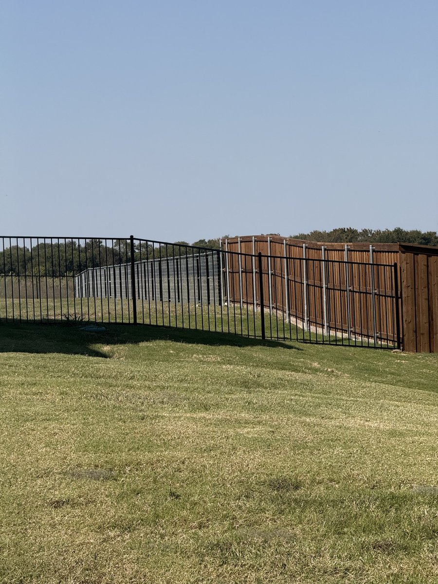 Freshly built cedar fence in Frisco TX by Landeros Fence & Construction